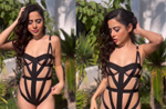 Urfi Javed poses in sexy swimsuit made of fabric strips amid legal trouble; pens note for haters